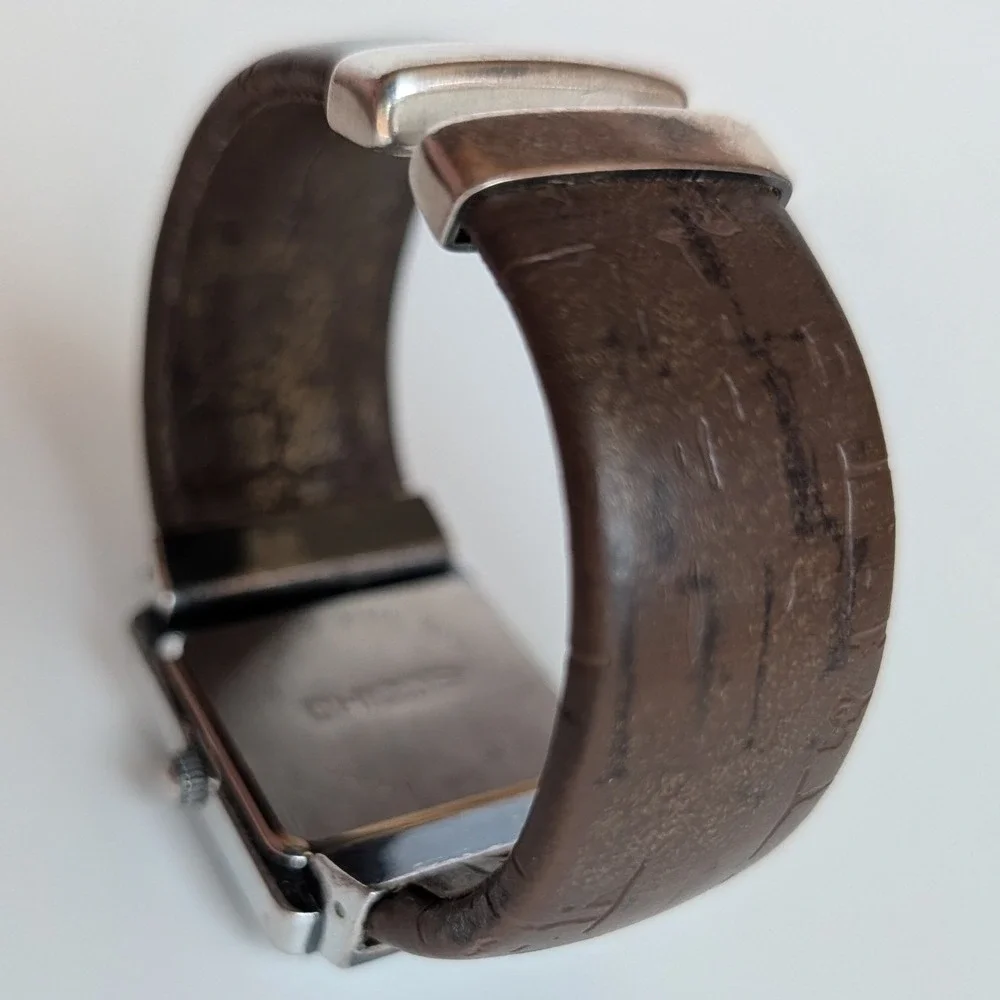 Chicos Womens Silver Tone Square Ornate Cuff Watch Brown Cork Band Japan